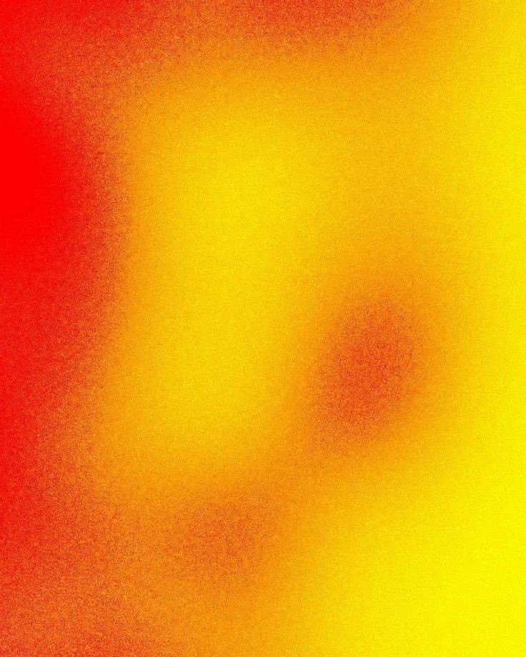 Grainy gradient glowing from red into warm yellow