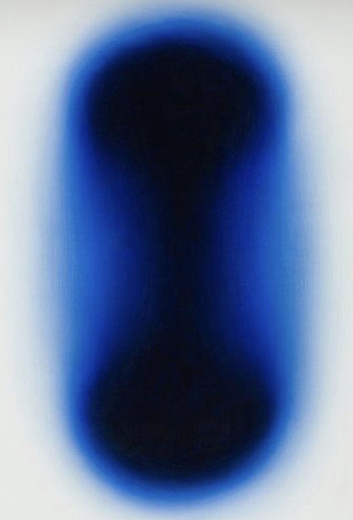 Deep blue glowing void dissolving into white
