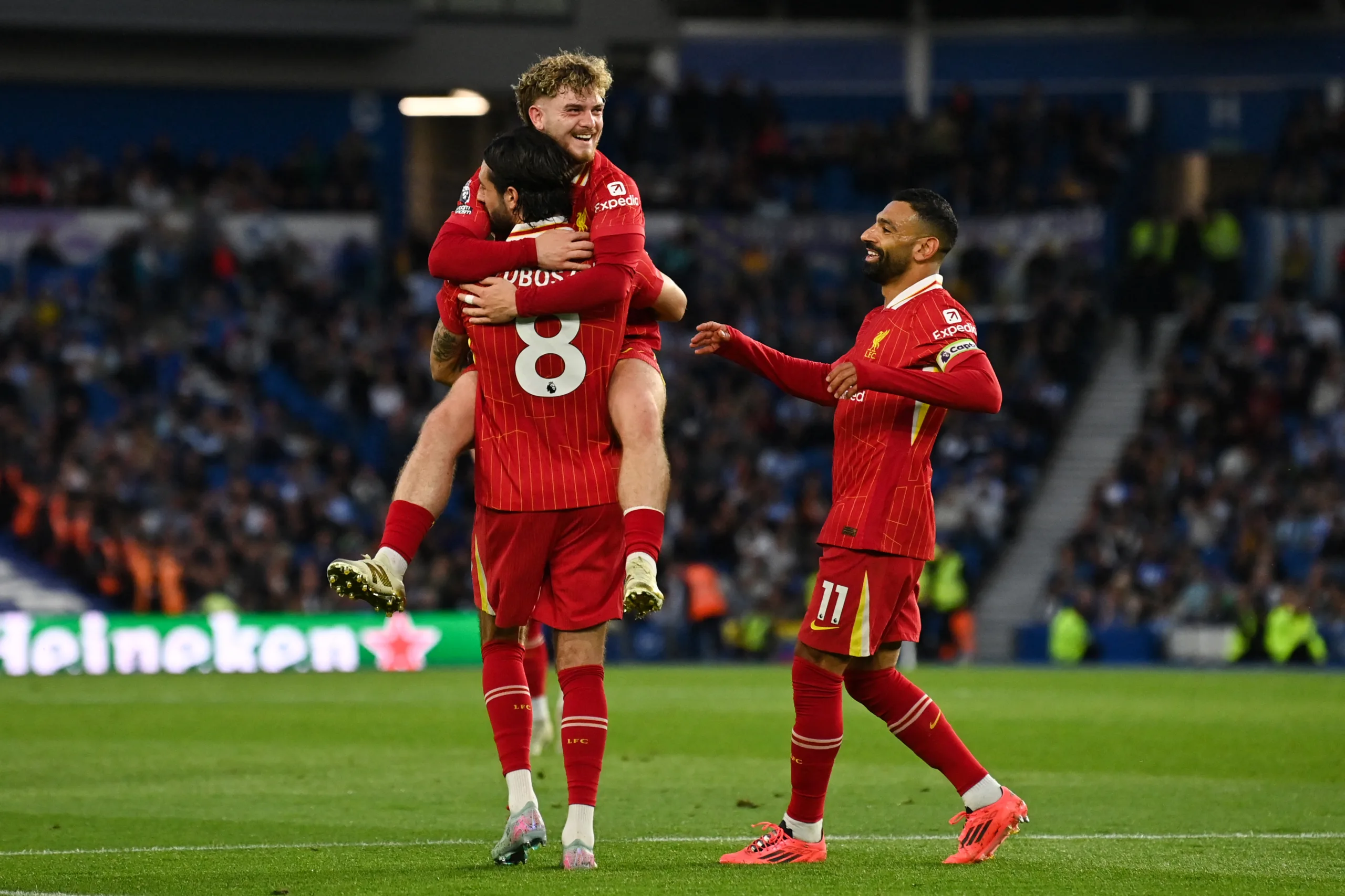 Liverpool players celebrating a goal — vivid HD colour, modern kit